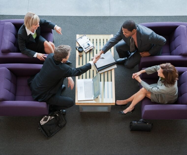 Business owners preparing to sell their business with expert guidance from a business broker to maximize value.